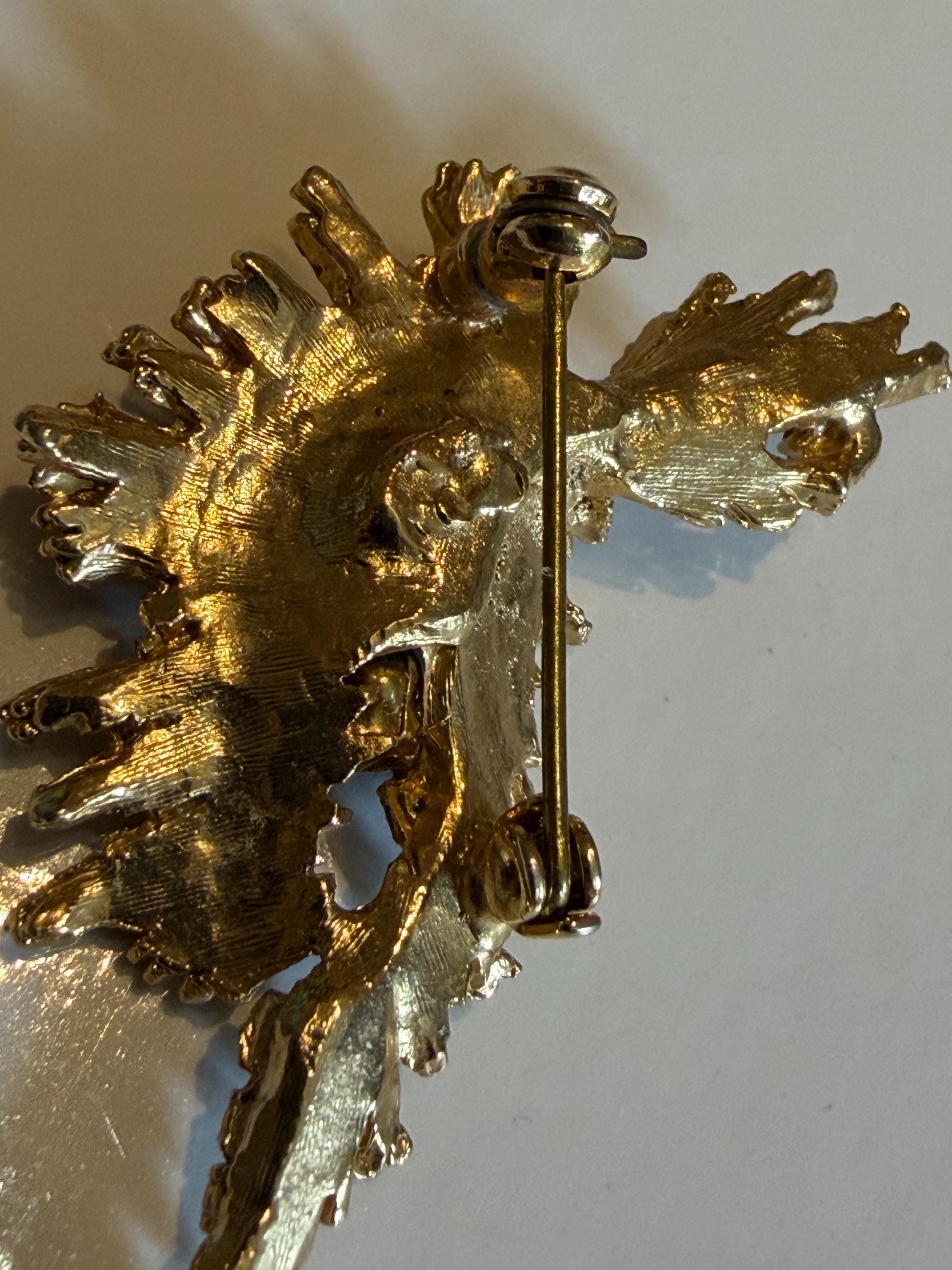 Vintage Gold Tone Starburst Brooch  Purple Rhinestone Floral Pin